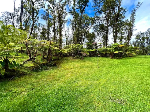 a view of a swimming pool with an outdoor space and seating area