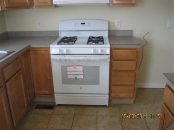 918 Jefferson Street Fall River, MA 02721 - Photo 3 of 6 a utility room with dryer and washer