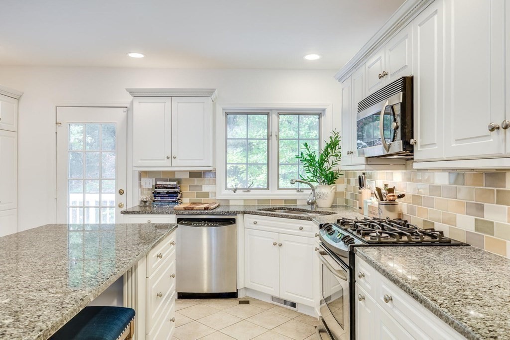 121 Beech Leaf Island Road Centerville, MA 02632 - Photo 20 of 42 a kitchen with sink stove and cabinets