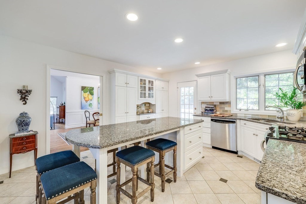 121 Beech Leaf Island Road Centerville, MA 02632 - Photo 23 of 42 a large kitchen with granite countertop lots of counter space and windows