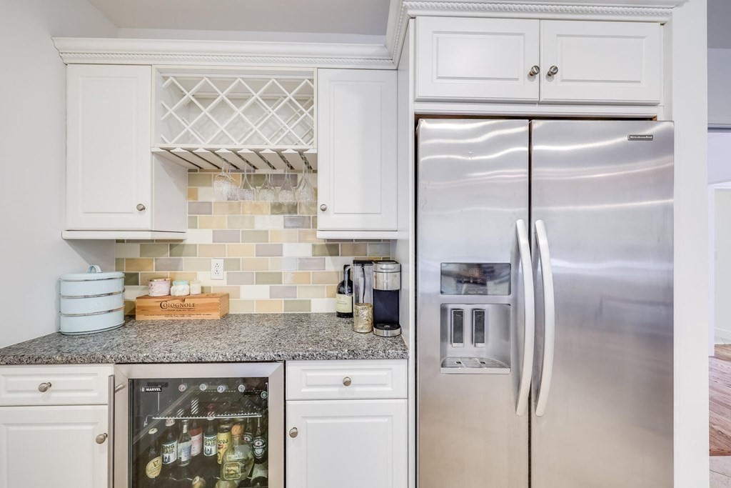 121 Beech Leaf Island Road Centerville, MA 02632 - Photo 25 of 42 a kitchen with granite countertop stainless steel appliances a refrigerator and cabinets