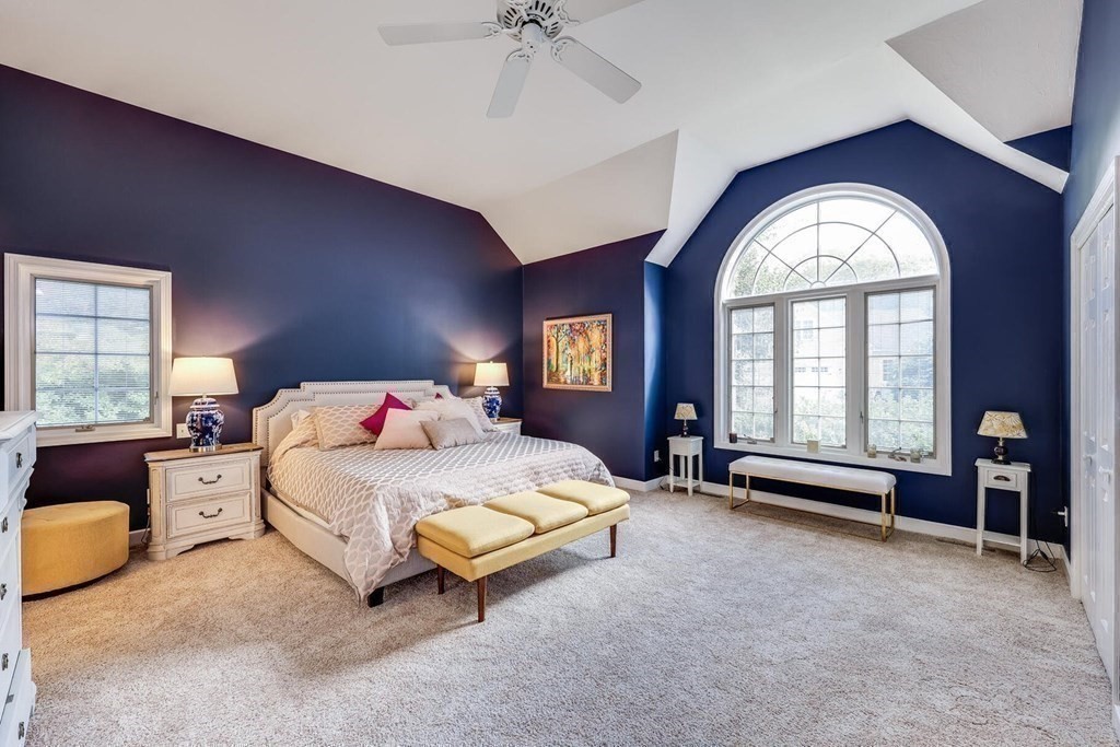 121 Beech Leaf Island Road Centerville, MA 02632 - Photo 29 of 42 a spacious bedroom with a bed and a large mirror