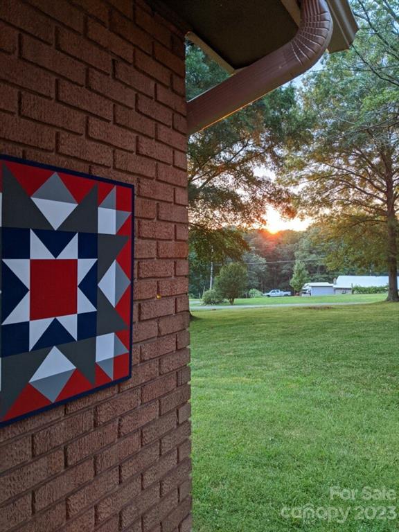 1180 Guy Road Hickory, NC 28602 - Photo 11 of 30 a backyard of a house with lots of green space and fountain