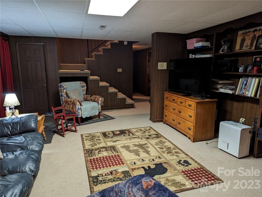 1180 Guy Road Hickory, NC 28602 - Photo 14 of 30 a bedroom with furniture and a book shelf