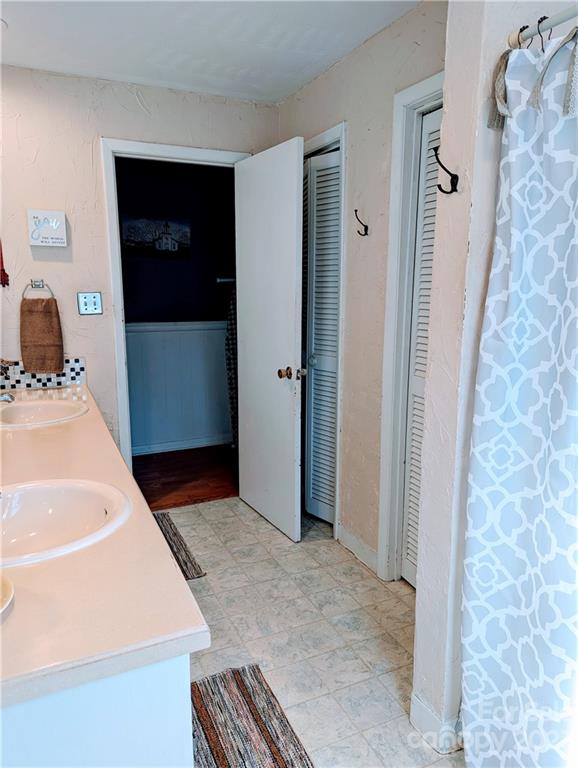 1180 Guy Road Hickory, NC 28602 - Photo 21 of 30 a living room with furniture and a gate