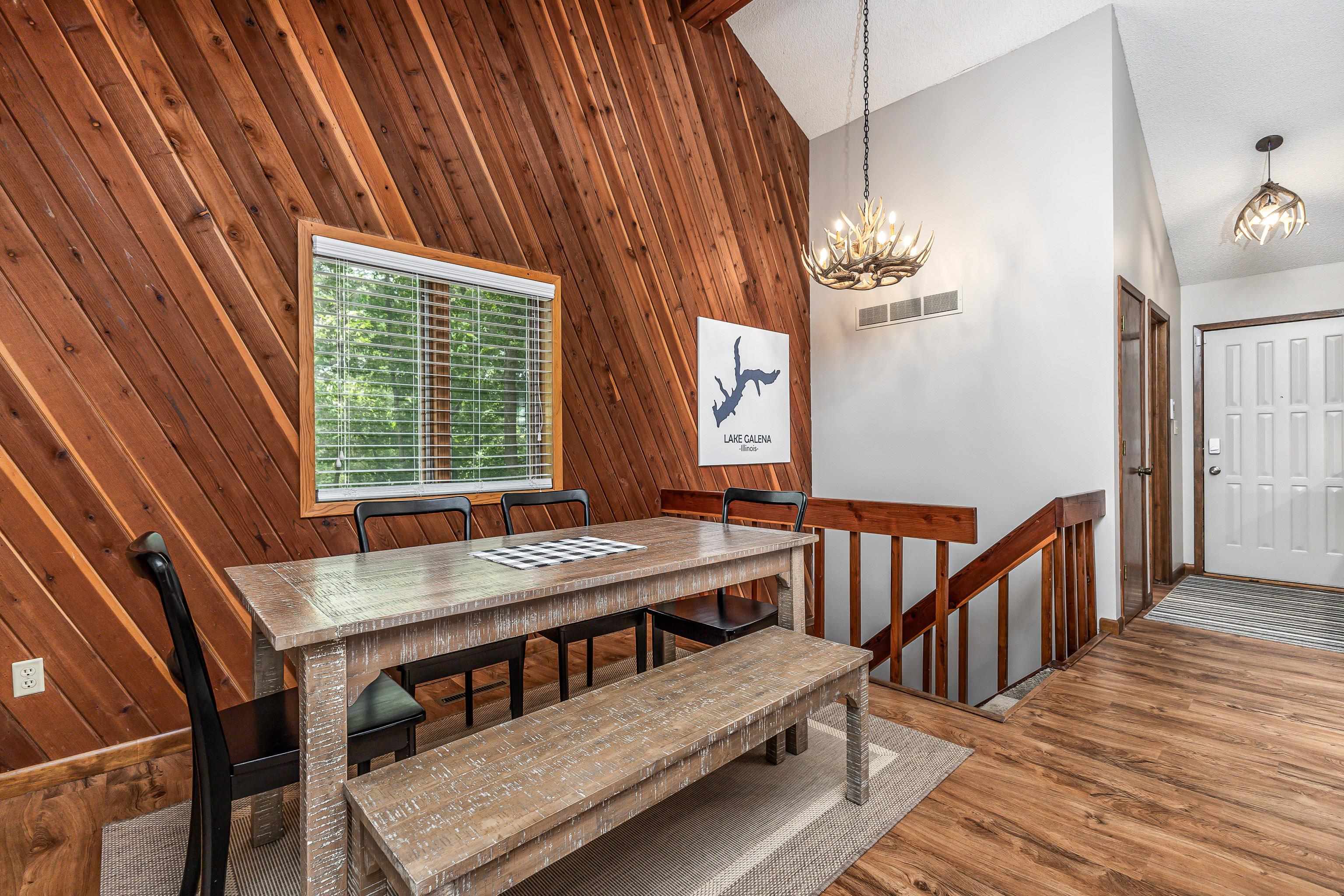4 Colony Court Galena, IL 61036 - Photo 16 of 32 a view of a dining room with furniture window and wooden floor
