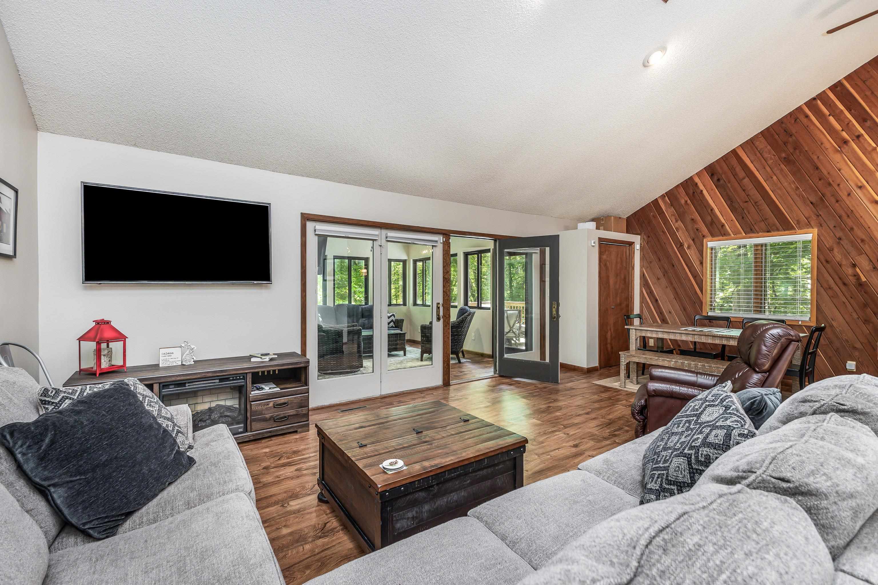 4 Colony Court Galena, IL 61036 - Photo 19 of 32 a living room with furniture and a flat screen tv