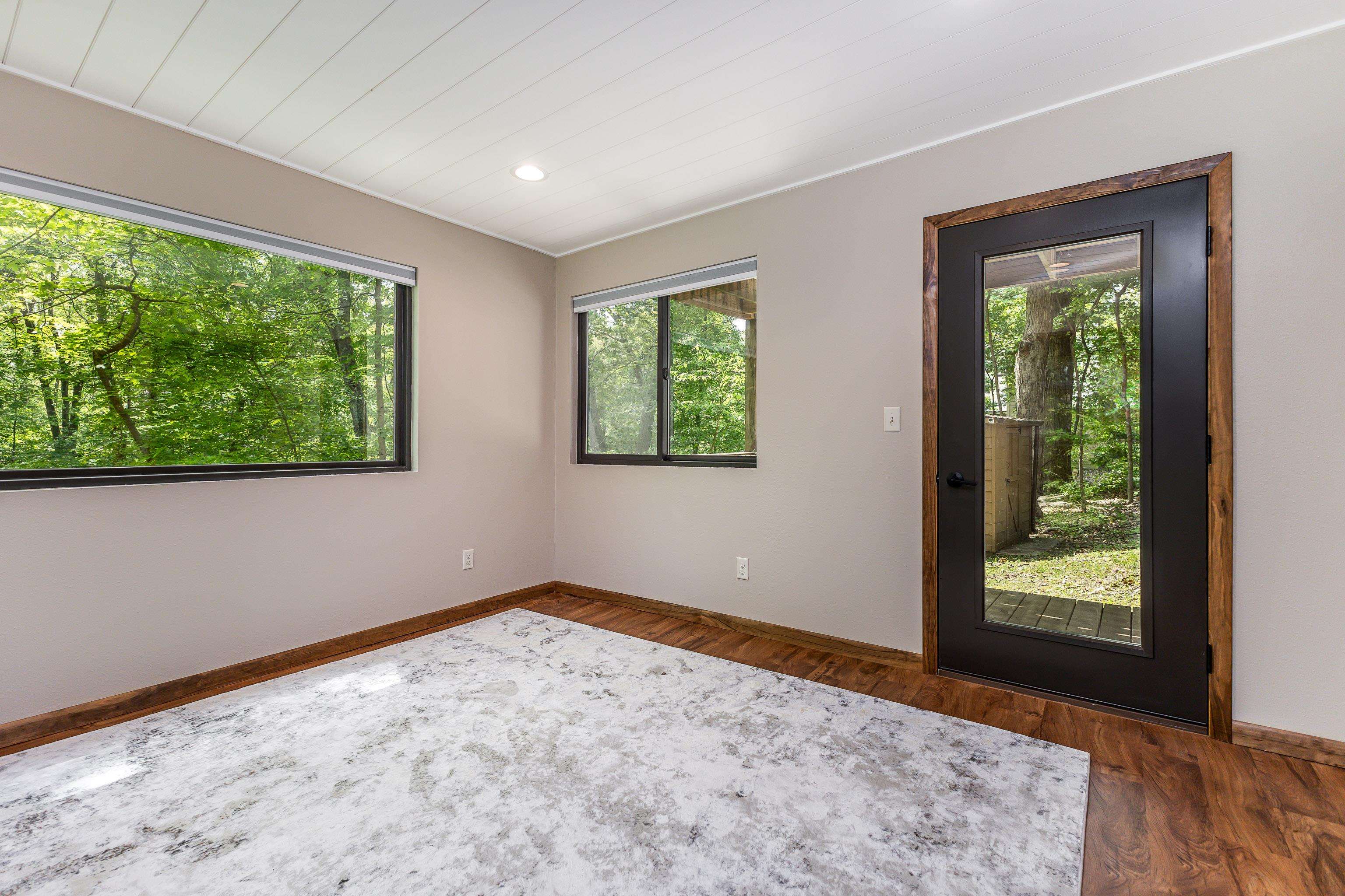 4 Colony Court Galena, IL 61036 - Photo 26 of 32 a view of an empty room with wooden floor and a window