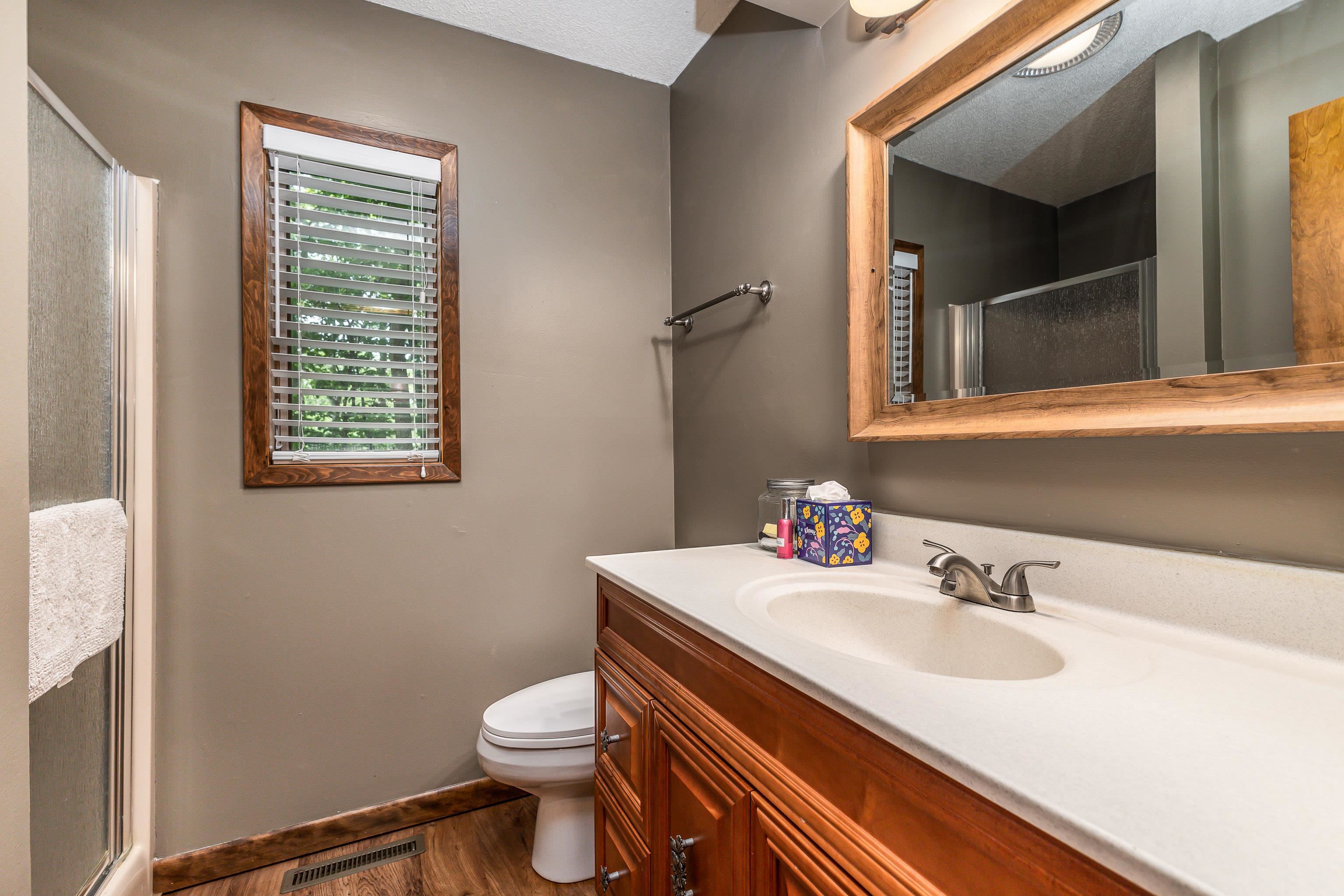 4 Colony Court Galena, IL 61036 - Photo 4 of 32 a bathroom with a sink toilet and vanity