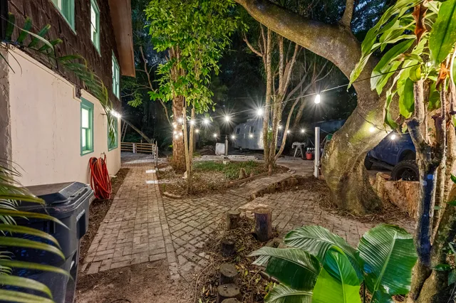 a lobby with furniture and floor to ceiling window