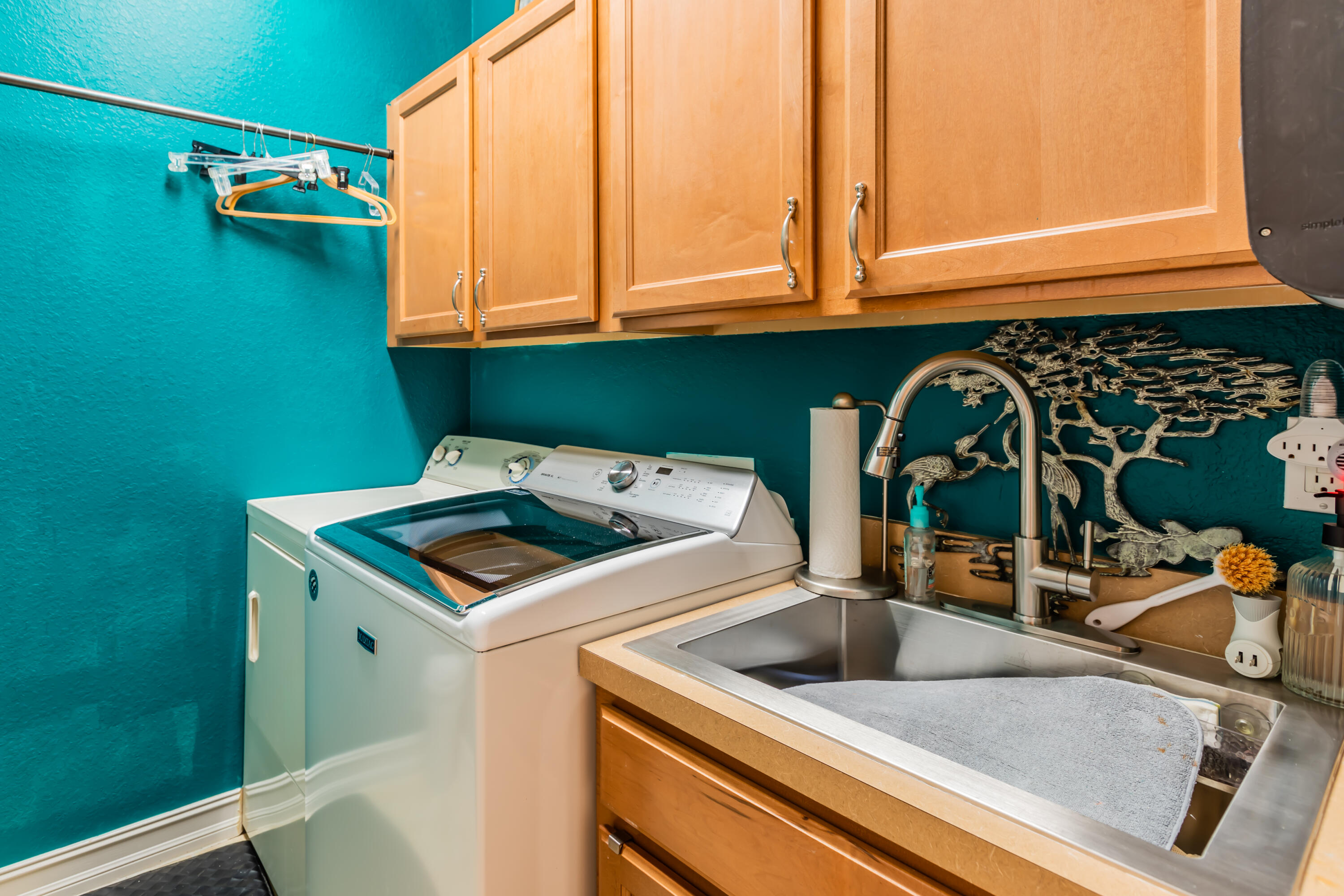 14728 Cranberry Naples Naples, FL 34114 - Photo 16 of 26 a kitchen with a sink cabinets and a window