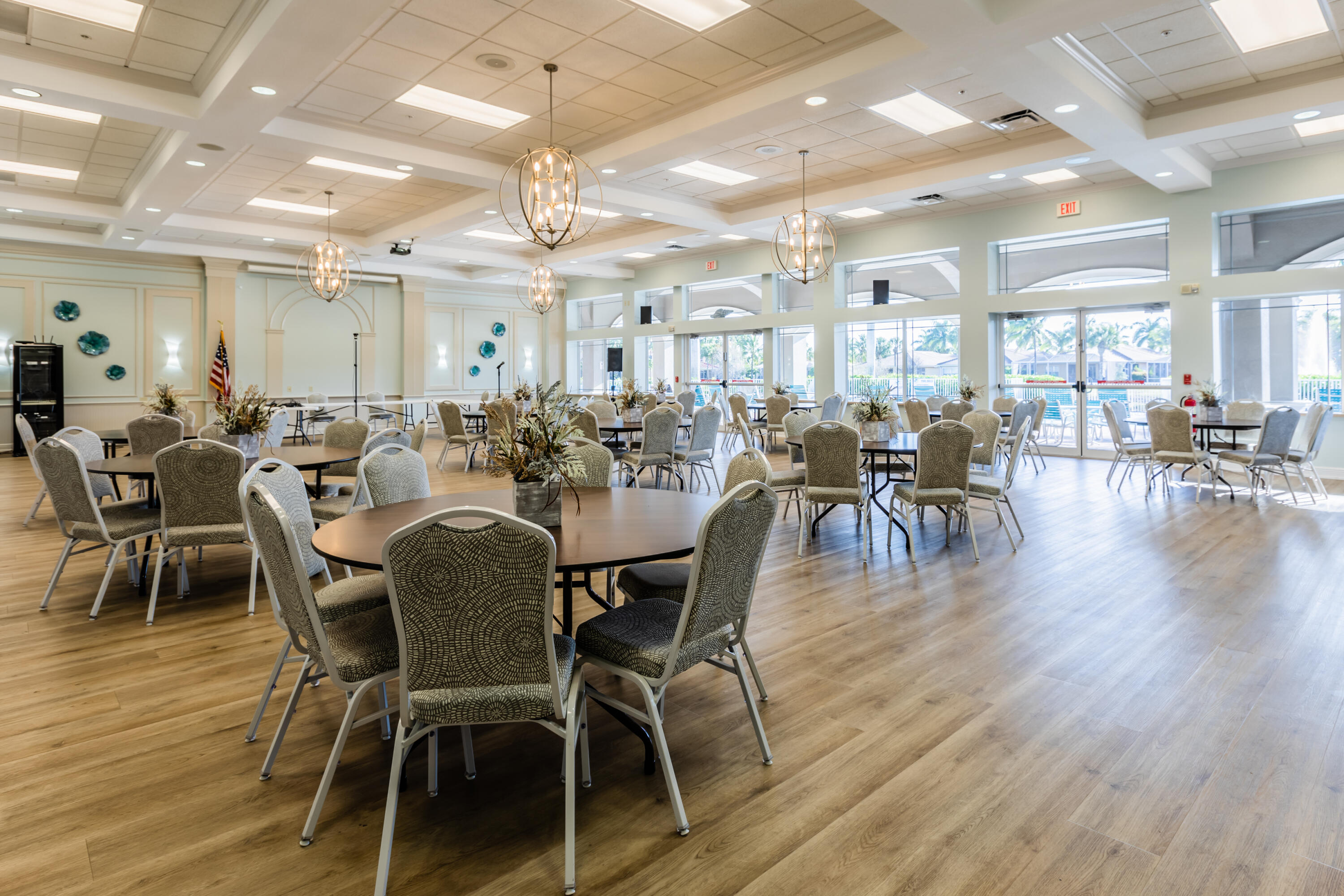 14728 Cranberry Naples Naples, FL 34114 - Photo 19 of 26 a view of a dining room with furniture wooden floor and chandelier