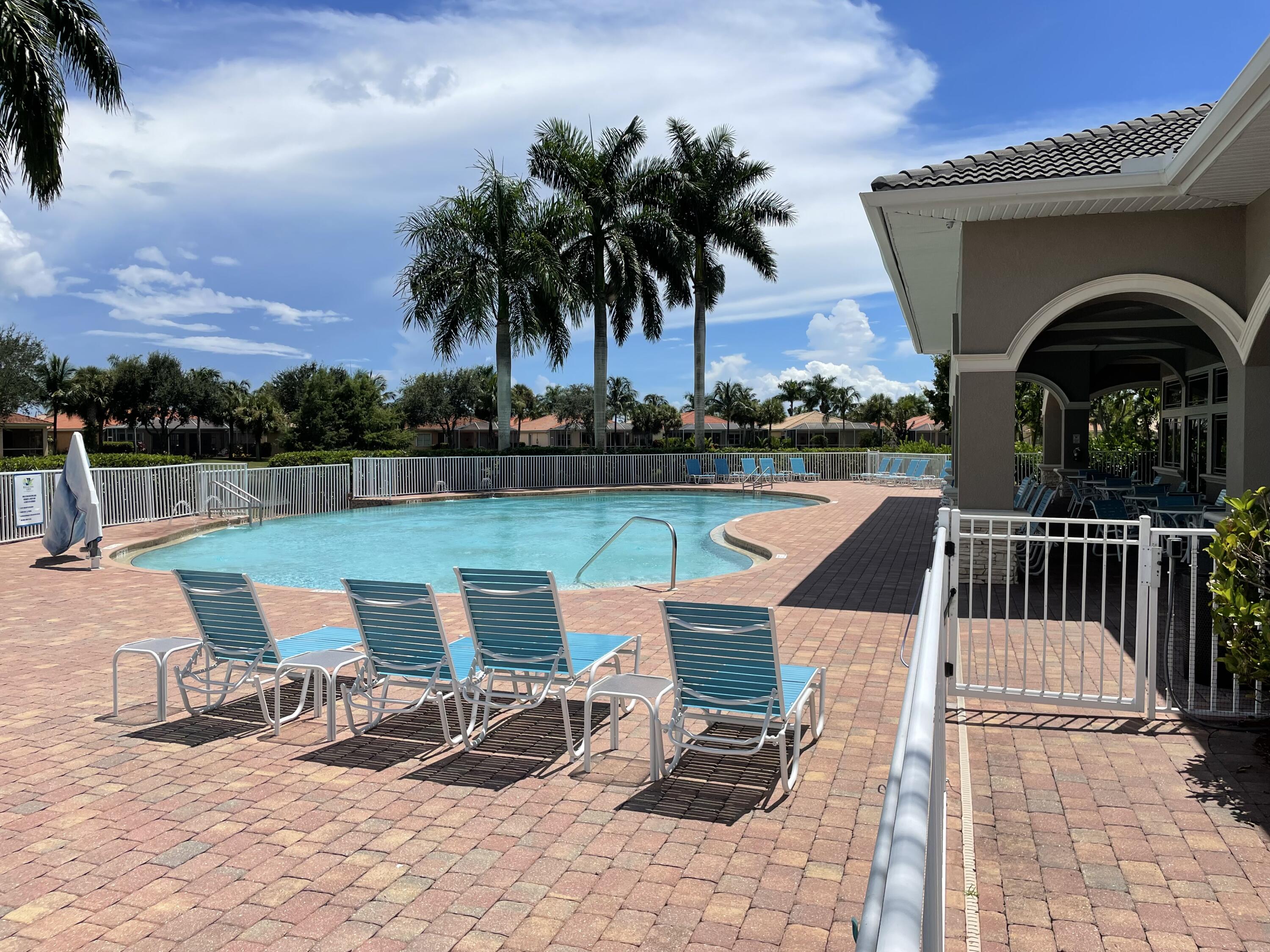 14728 Cranberry Naples Naples, FL 34114 - Photo 22 of 26 a view of a chairs and table on the terrace