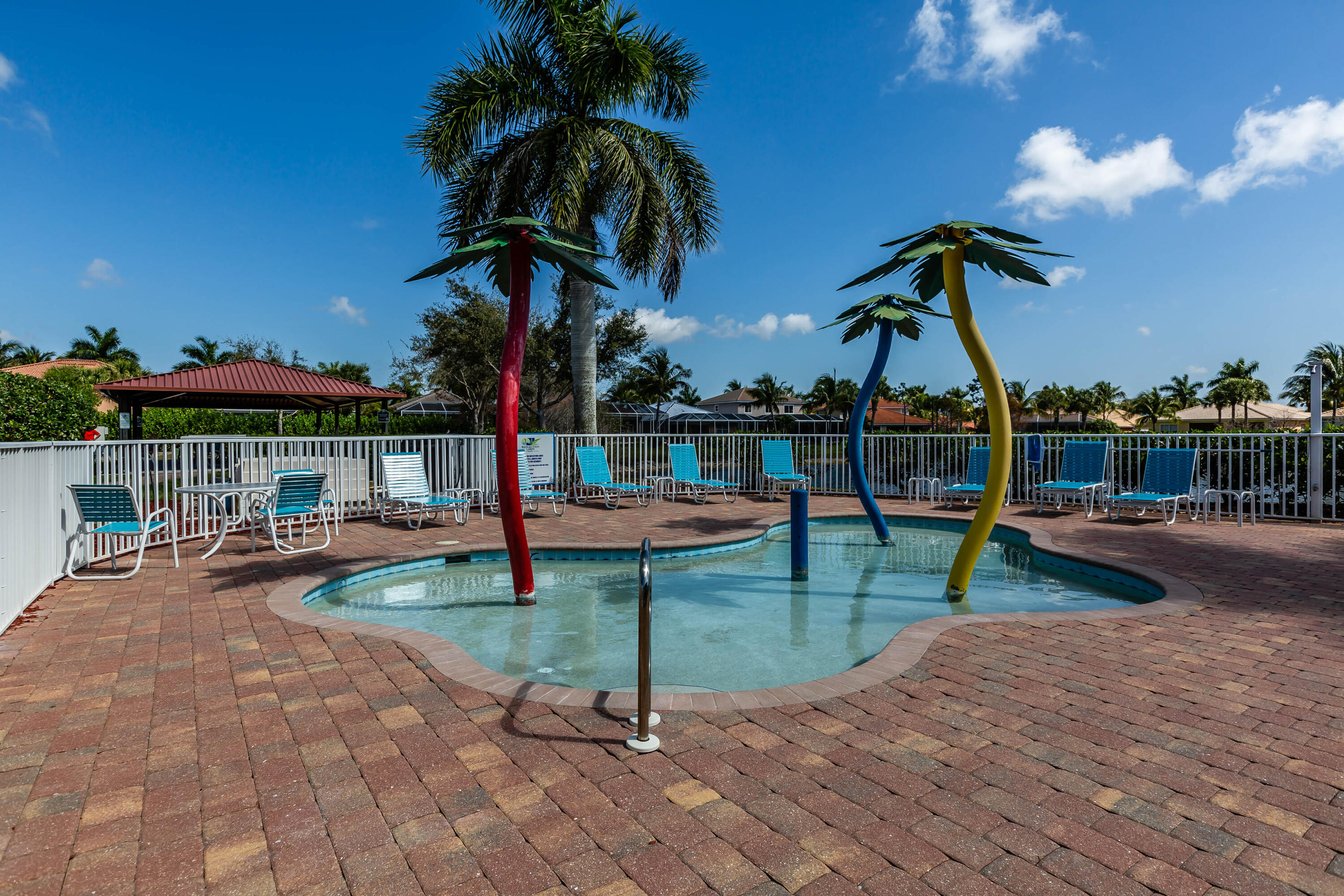 14728 Cranberry Naples Naples, FL 34114 - Photo 23 of 26 a view of a swimming pool with a patio