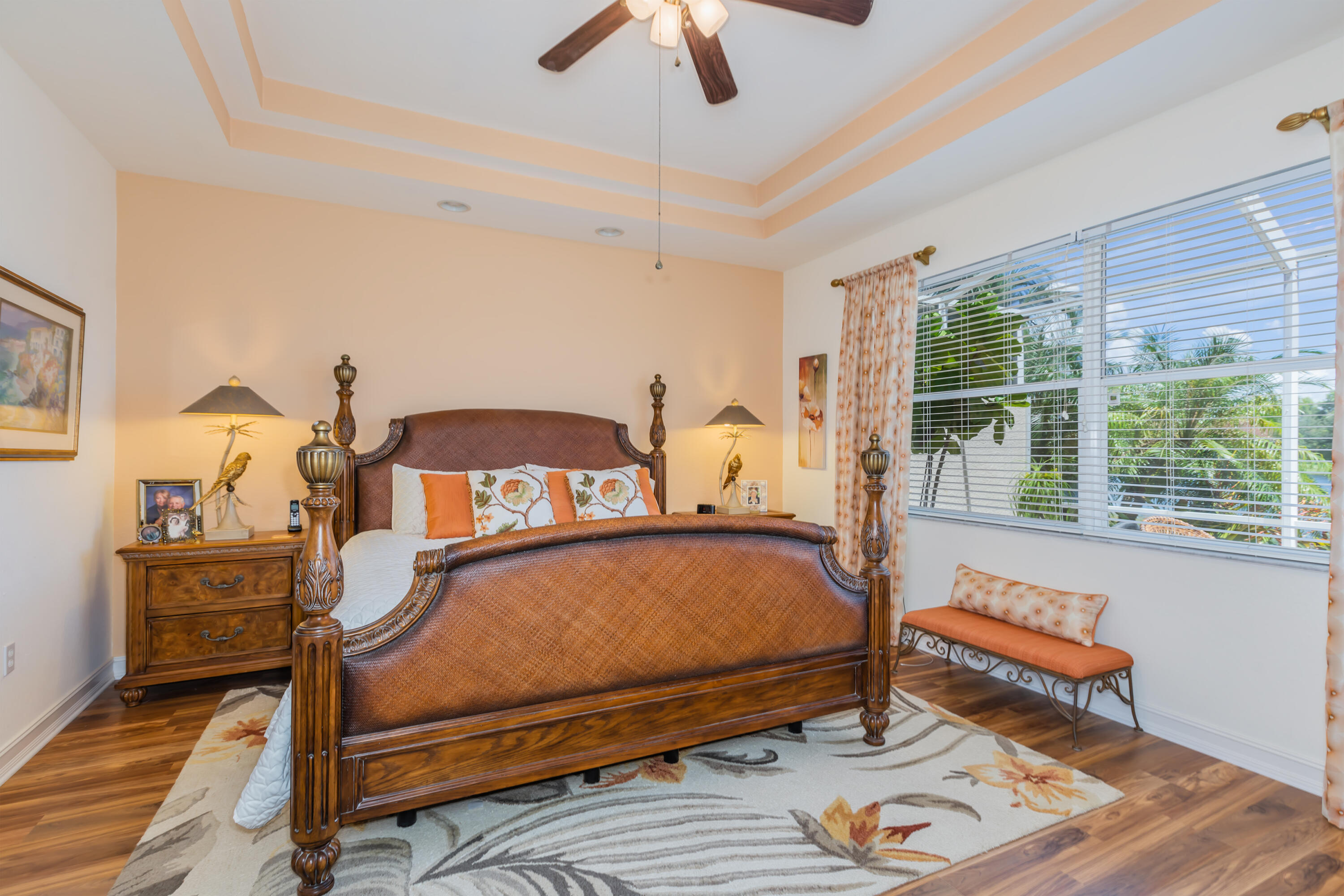 14728 Cranberry Naples Naples, FL 34114 - Photo 10 of 26 a bedroom with a bed wooden floor and window