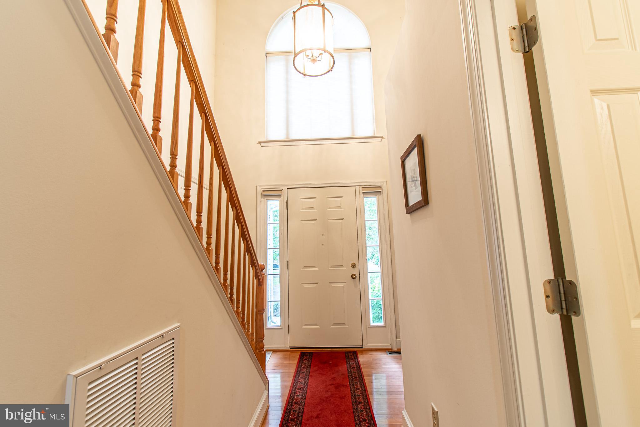 228 Tyler Avenue St. Michaels, MD 21663 - Photo 20 of 44 a view of entryway with wooden floor