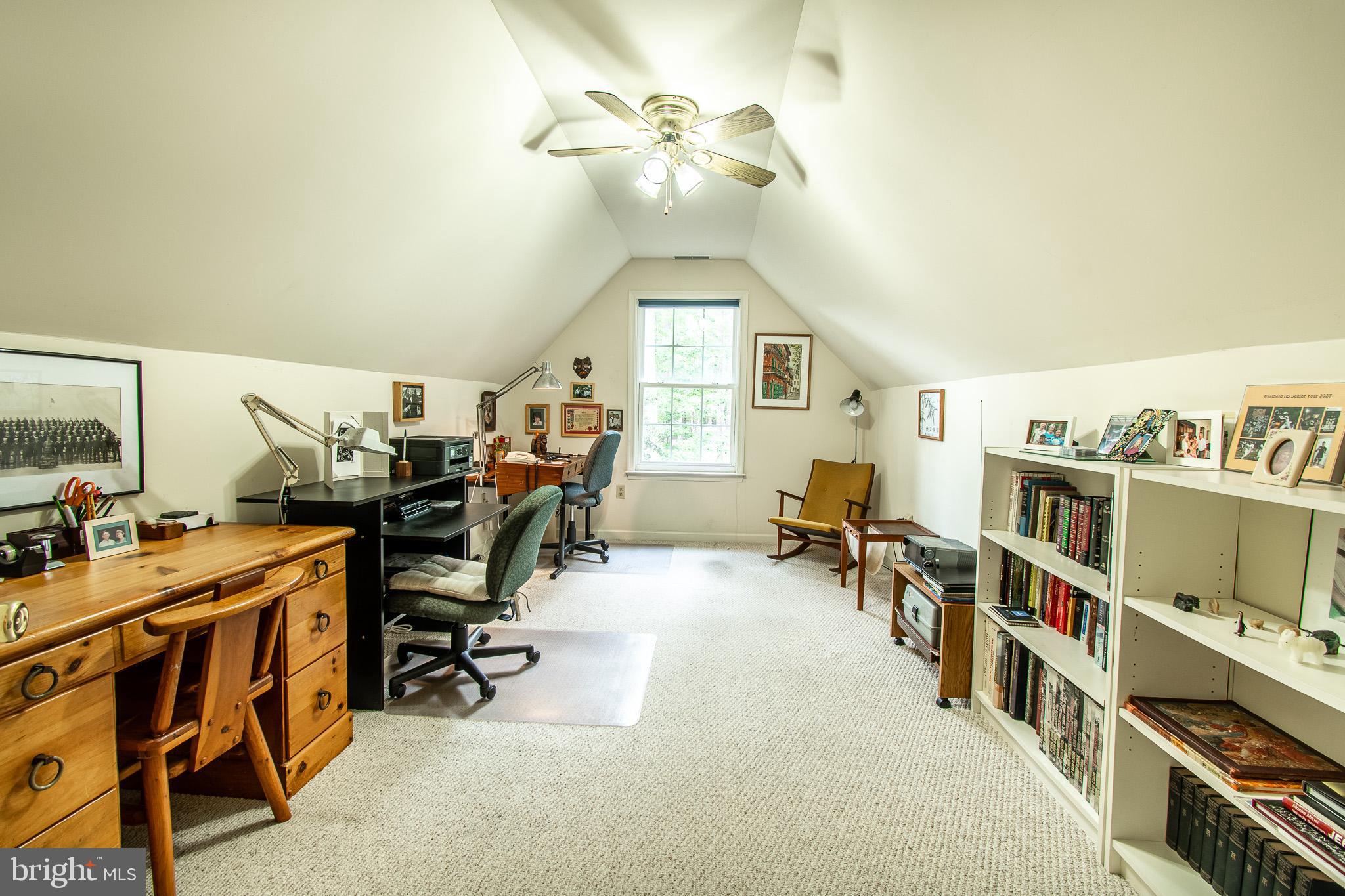 228 Tyler Avenue St. Michaels, MD 21663 - Photo 22 of 44 a view of a livingroom with workspace and a window