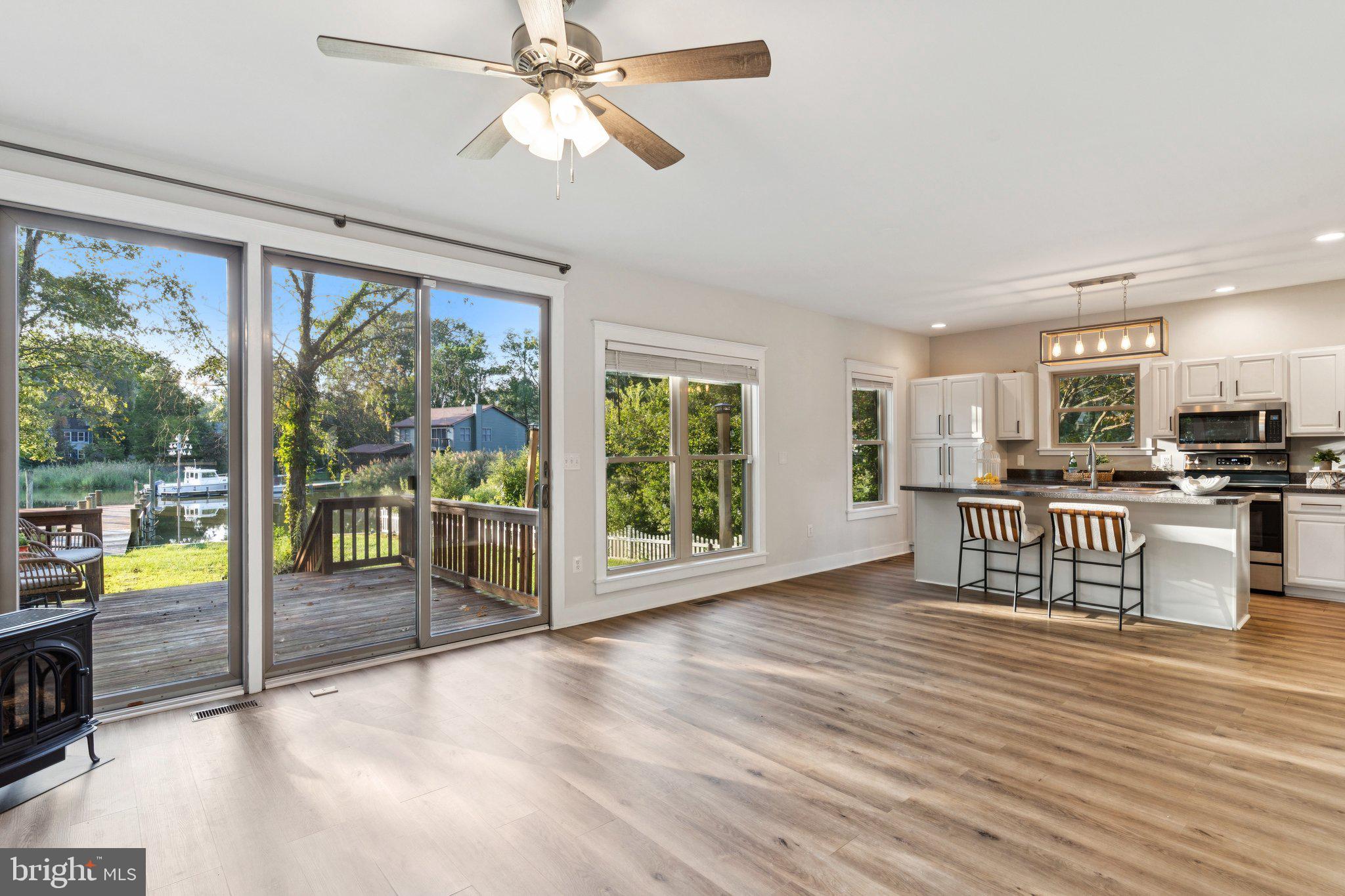 4922 Lerch Drive Shady Side, MD 20764 - Photo 2 of 56 a view of kitchen with furniture appliances and wooden floor