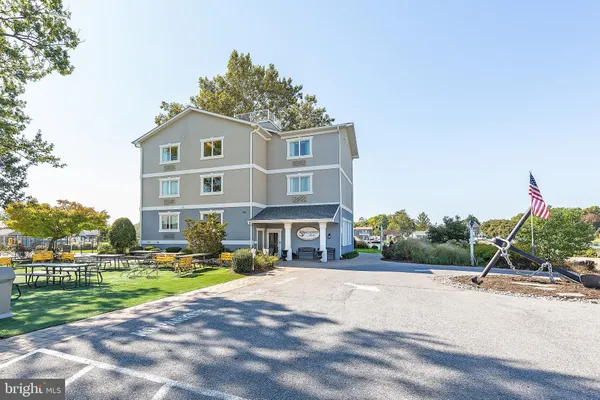 a view of a building with a street