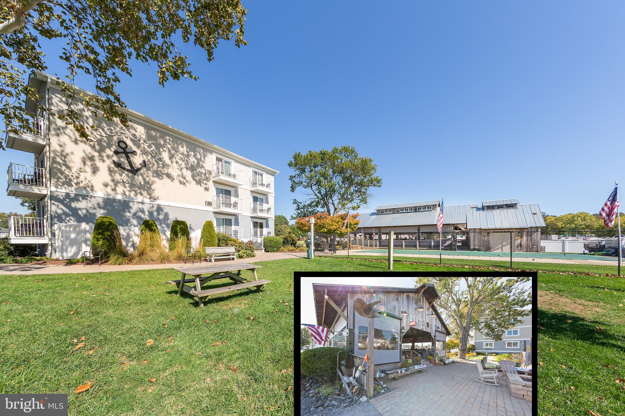 4922 Lerch Drive Shady Side, MD 20764 - Photo 40 of 56 a view of a bench in front of a building