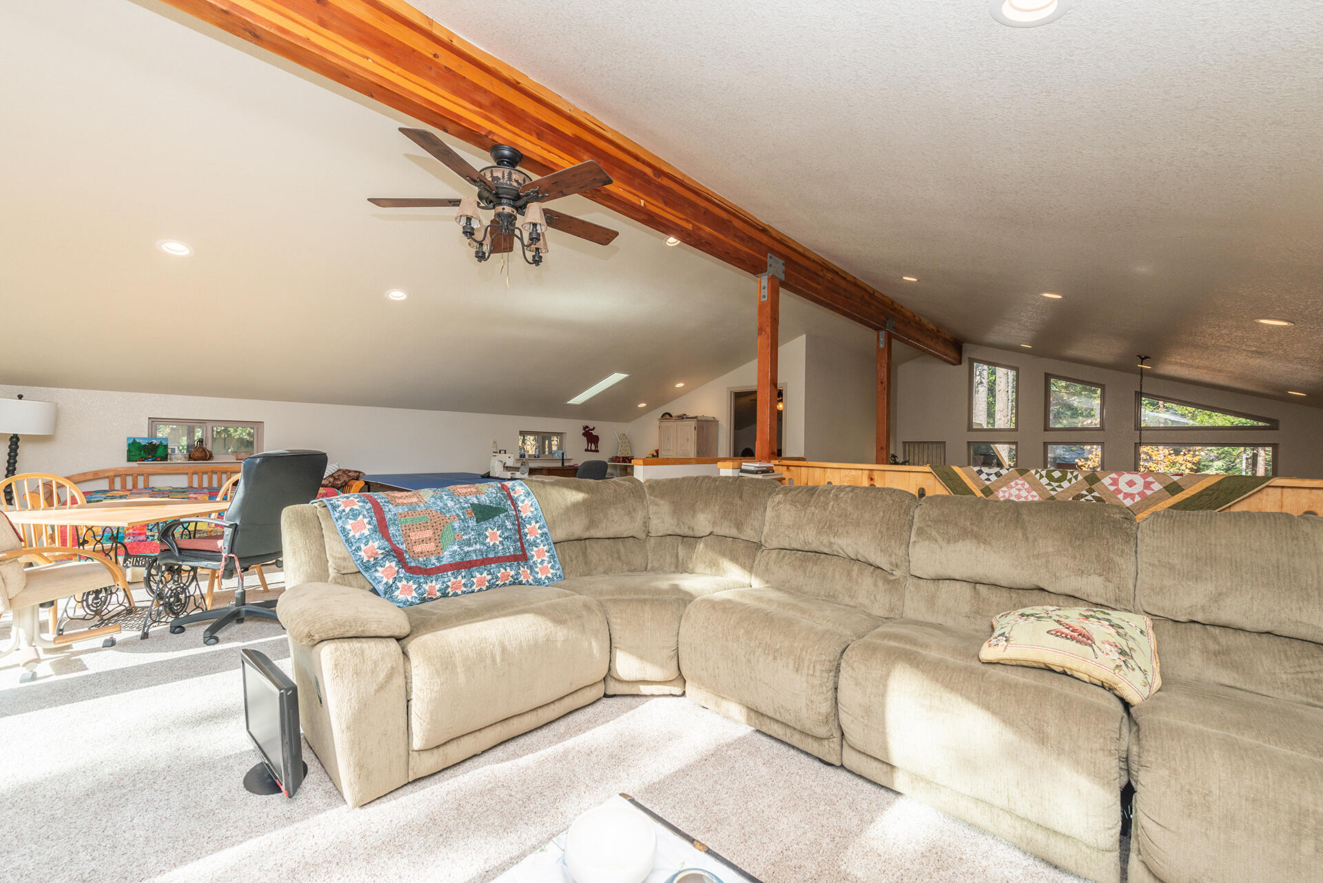 851 Mountain Aire Road Trinity Center, CA 96091 - Photo 30 of 54 a living room with furniture and a flat screen tv