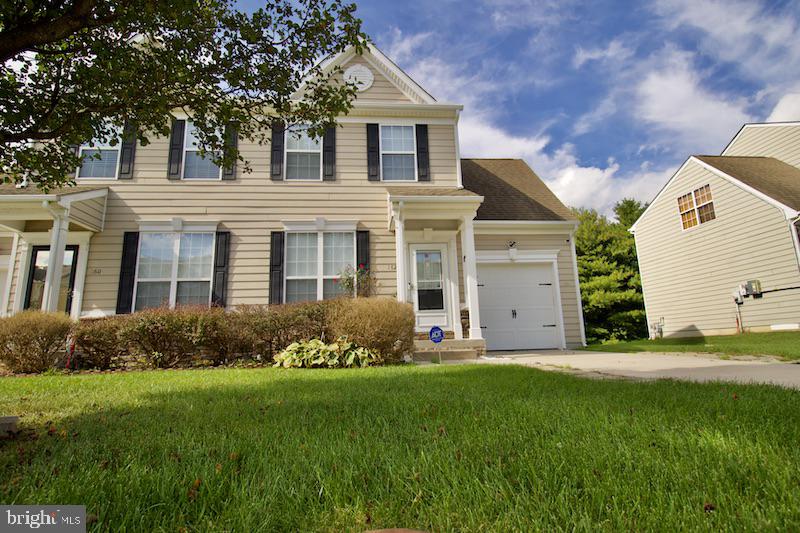 162 Lexington Place Dover, DE 19901 - Photo 3 of 48 front view of a house with a yard