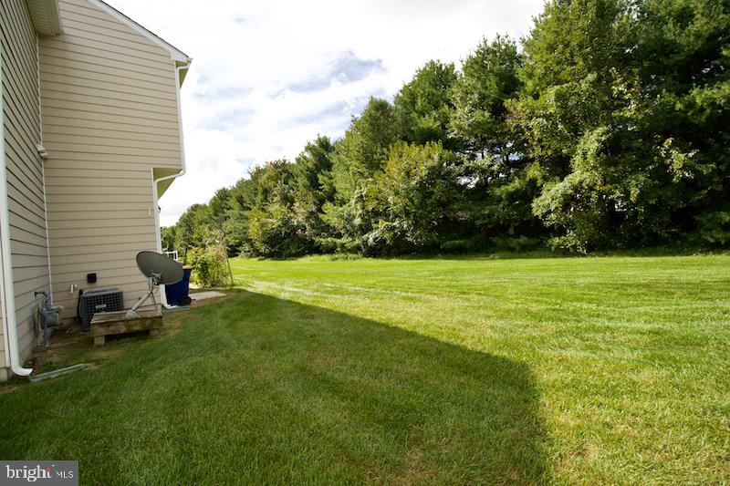 162 Lexington Place Dover, DE 19901 - Photo 45 of 48 a view of a house with a backyard