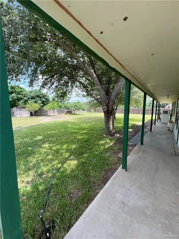 a view of outdoor space with deck and garden