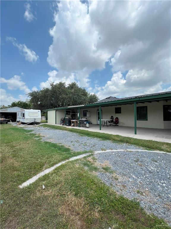 414 Mockingbird Lane Mercedes, TX 78570 - Photo 26 of 27 a view of a house with backyard