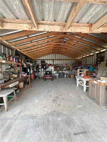 a view of a room with storage and utility room
