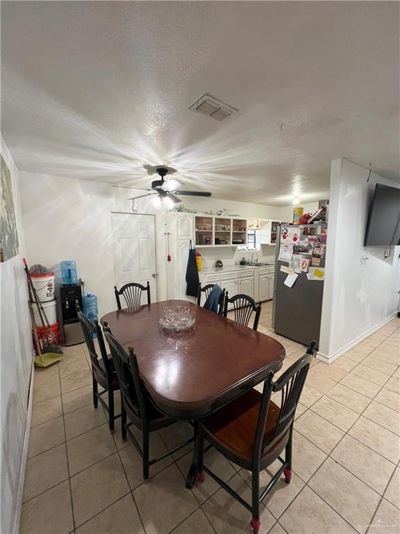 414 Mockingbird Lane Mercedes, TX 78570 - Photo 5 of 27 a view of a dining room with furniture