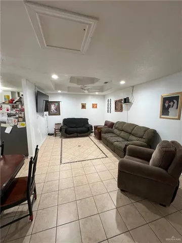 a living room with furniture and a couch