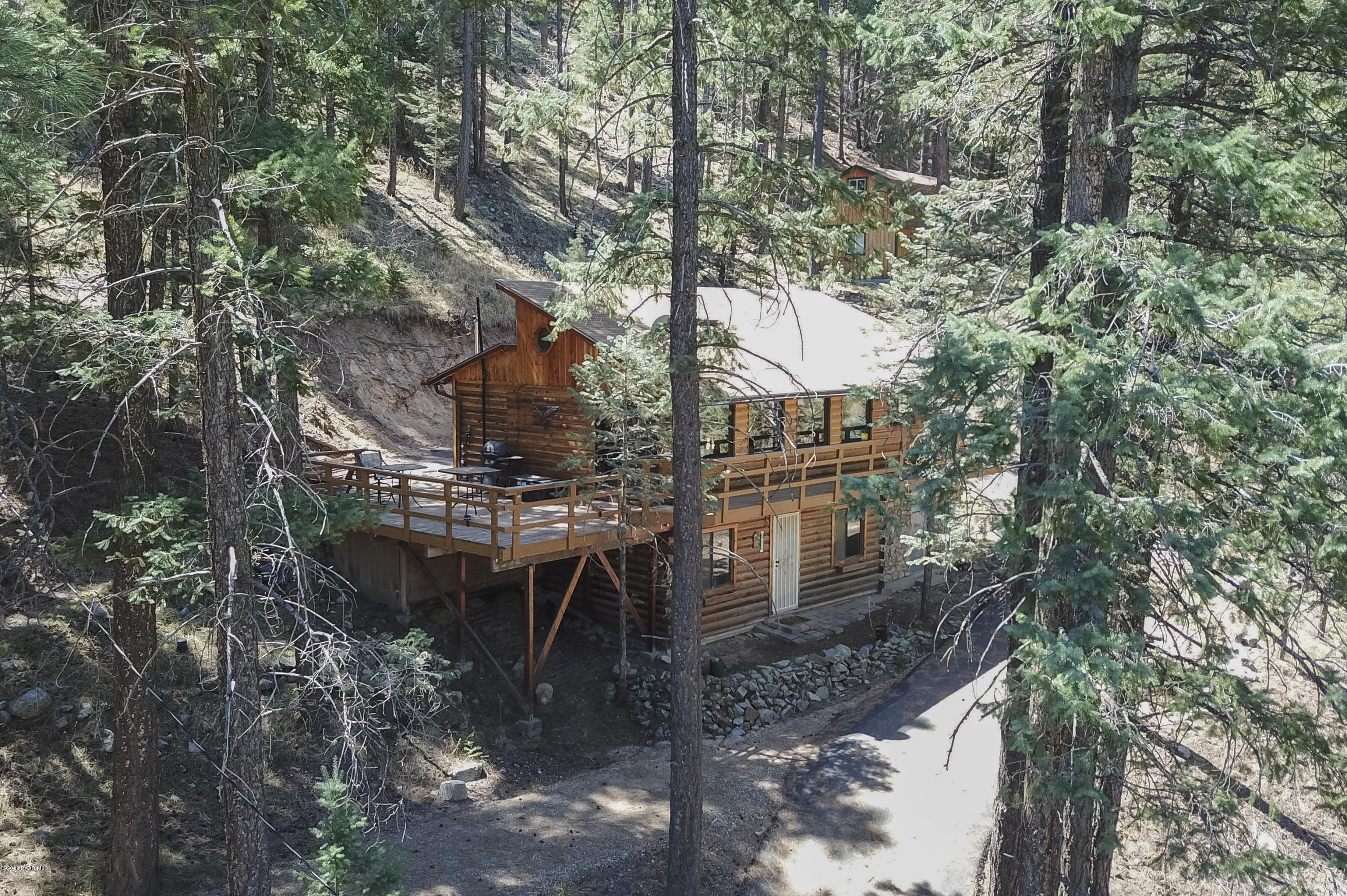 3909 East Sheldon Road Prescott, AZ 86303 - Photo 1 of 23 Log -Sided Cabin In The Woods