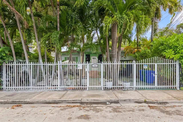 a view of a gate with a street view