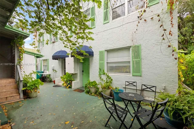 a front view of a house with patio