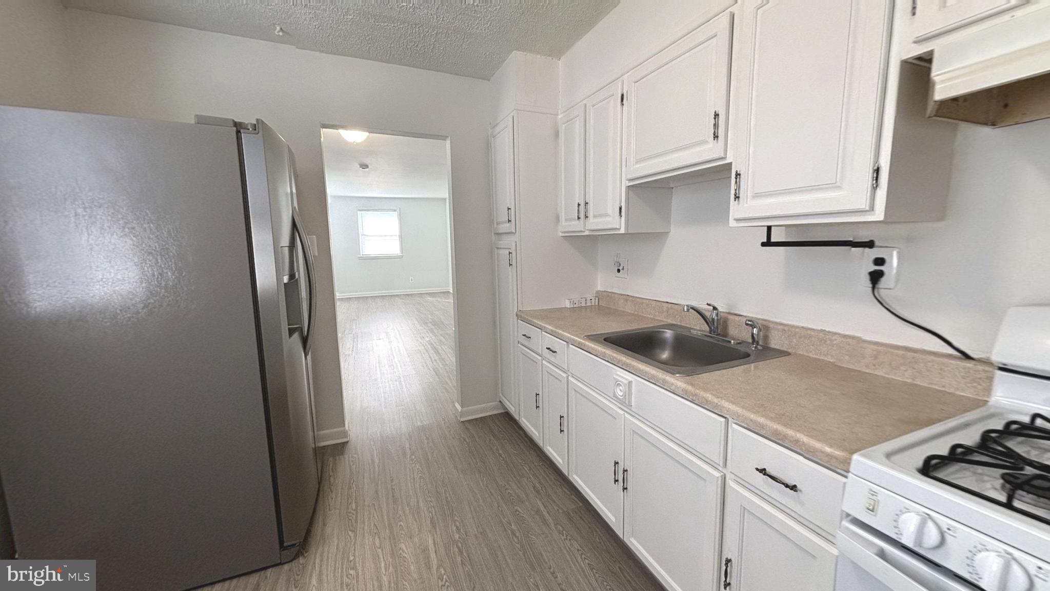 9906 Lanham Severn Road Lanham, MD 20706 - Photo 3 of 37 Upstairs Kitchen with gas cooking