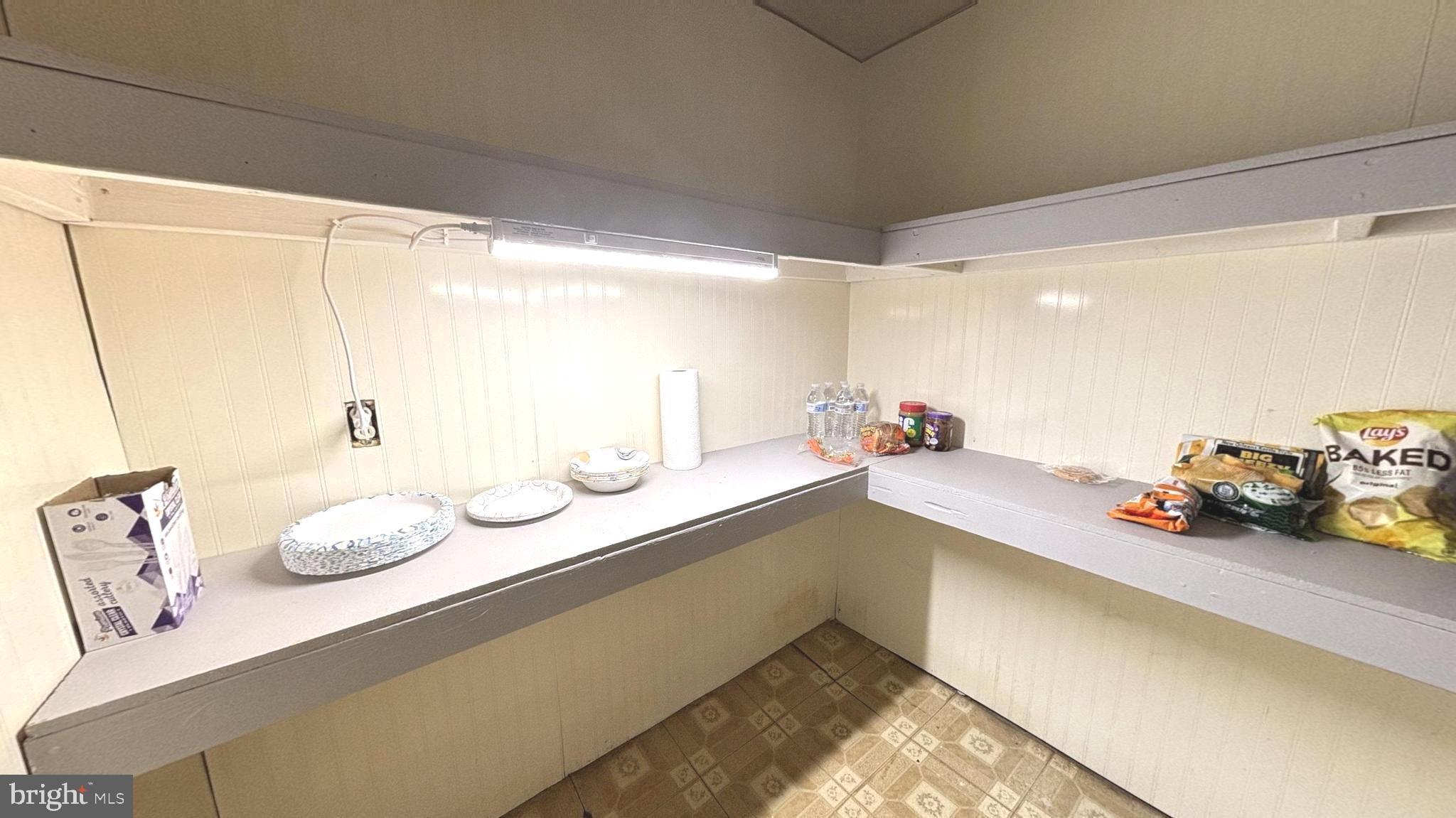 9906 Lanham Severn Road Lanham, MD 20706 - Photo 31 of 37 Lower level storage area