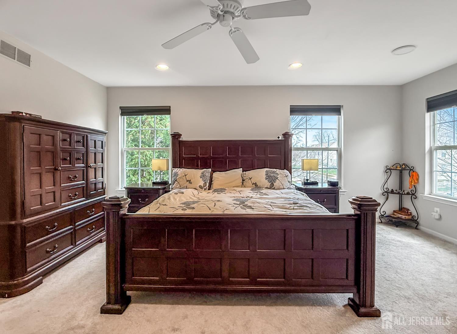 22 Ginger Drive Edison, NJ 08837 - Photo 14 of 41 a bedroom with a bed and a chandelier