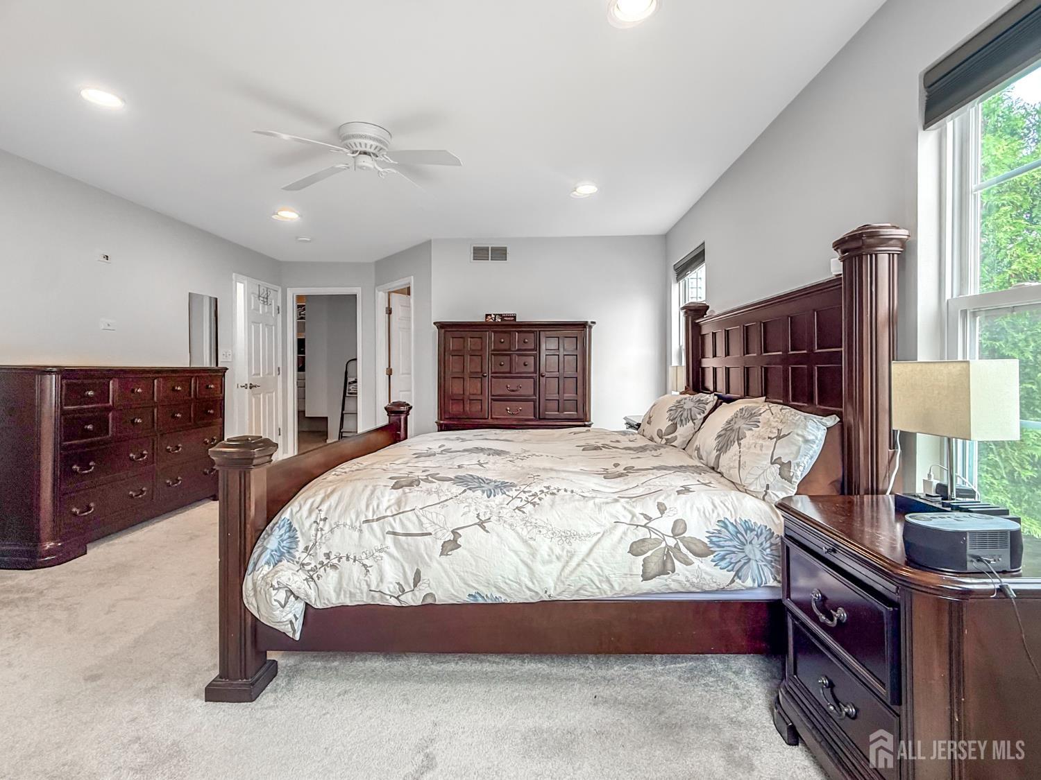 22 Ginger Drive Edison, NJ 08837 - Photo 15 of 41 a bedroom with a large bed and a dresser