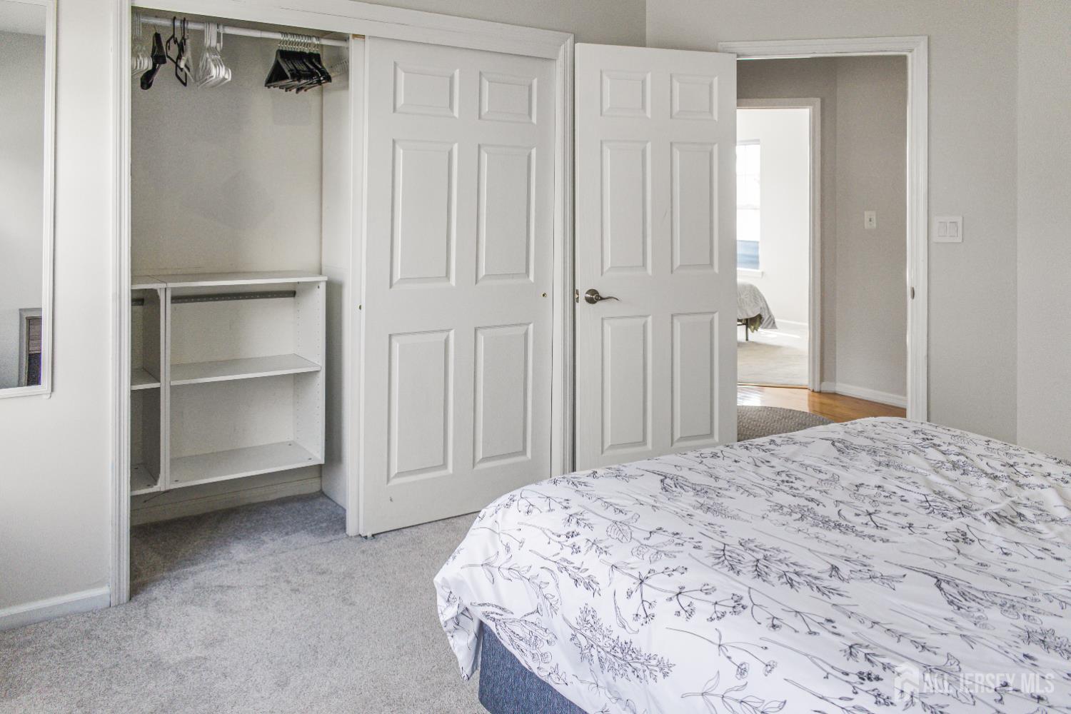 22 Ginger Drive Edison, NJ 08837 - Photo 25 of 41 a bedroom with a bed and a cabinet