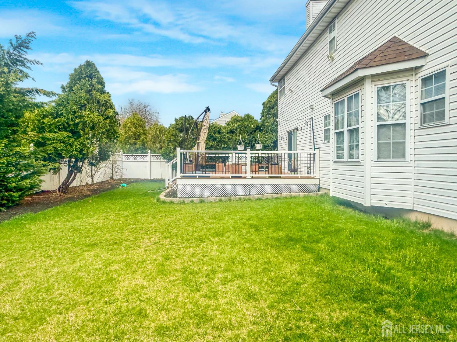 22 Ginger Drive Edison, NJ 08837 - Photo 39 of 41 a view of house with backyard and a garden