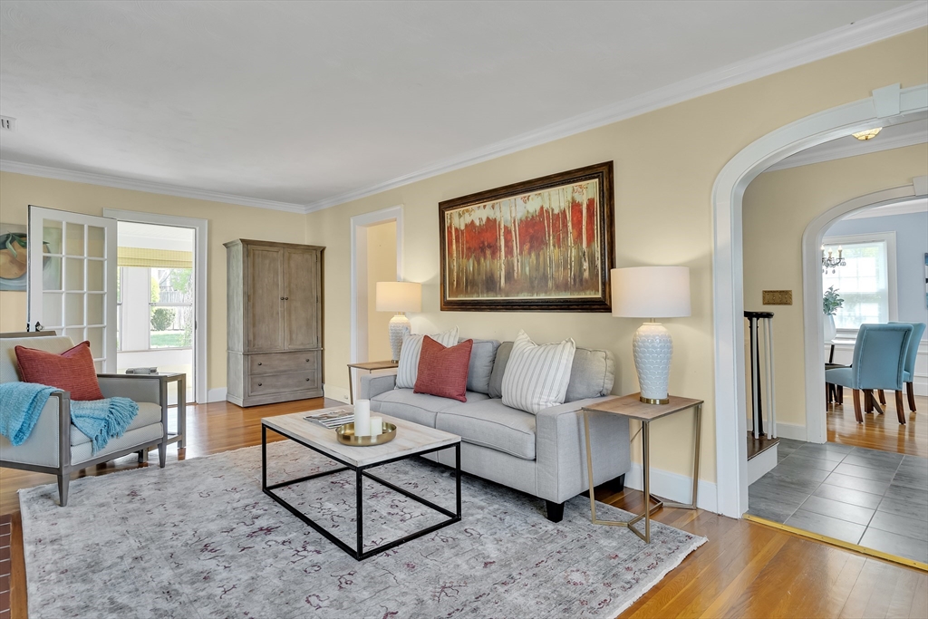 70 Howitt Road Boston, MA 02132 - Photo 9 of 30 a living room with furniture a rug and a table