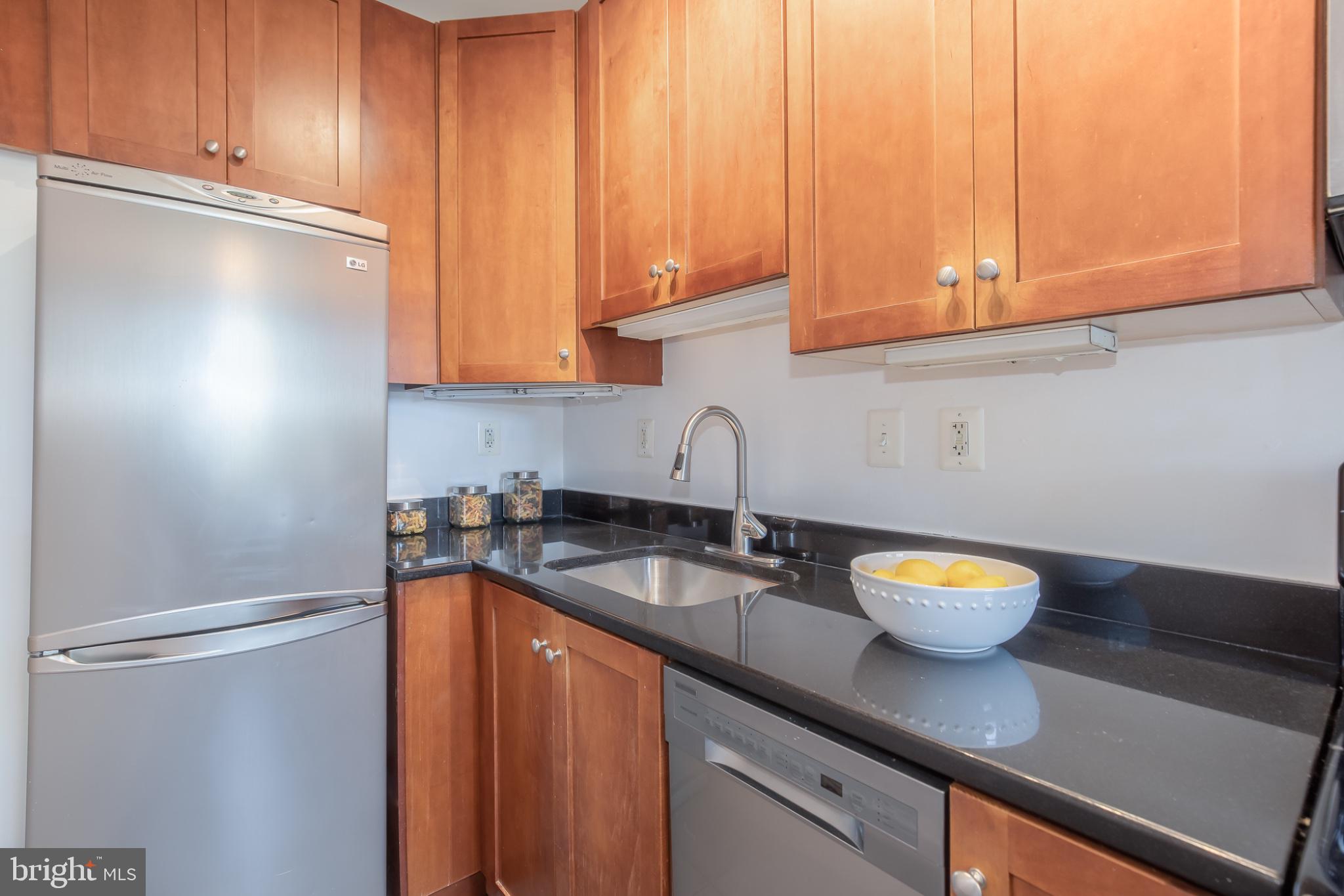 3314 Mt Pleasant Street Northwest, Unit 41 Washington, DC 20010 - Photo 19 of 30 Modern kitchen with sleek finishes.