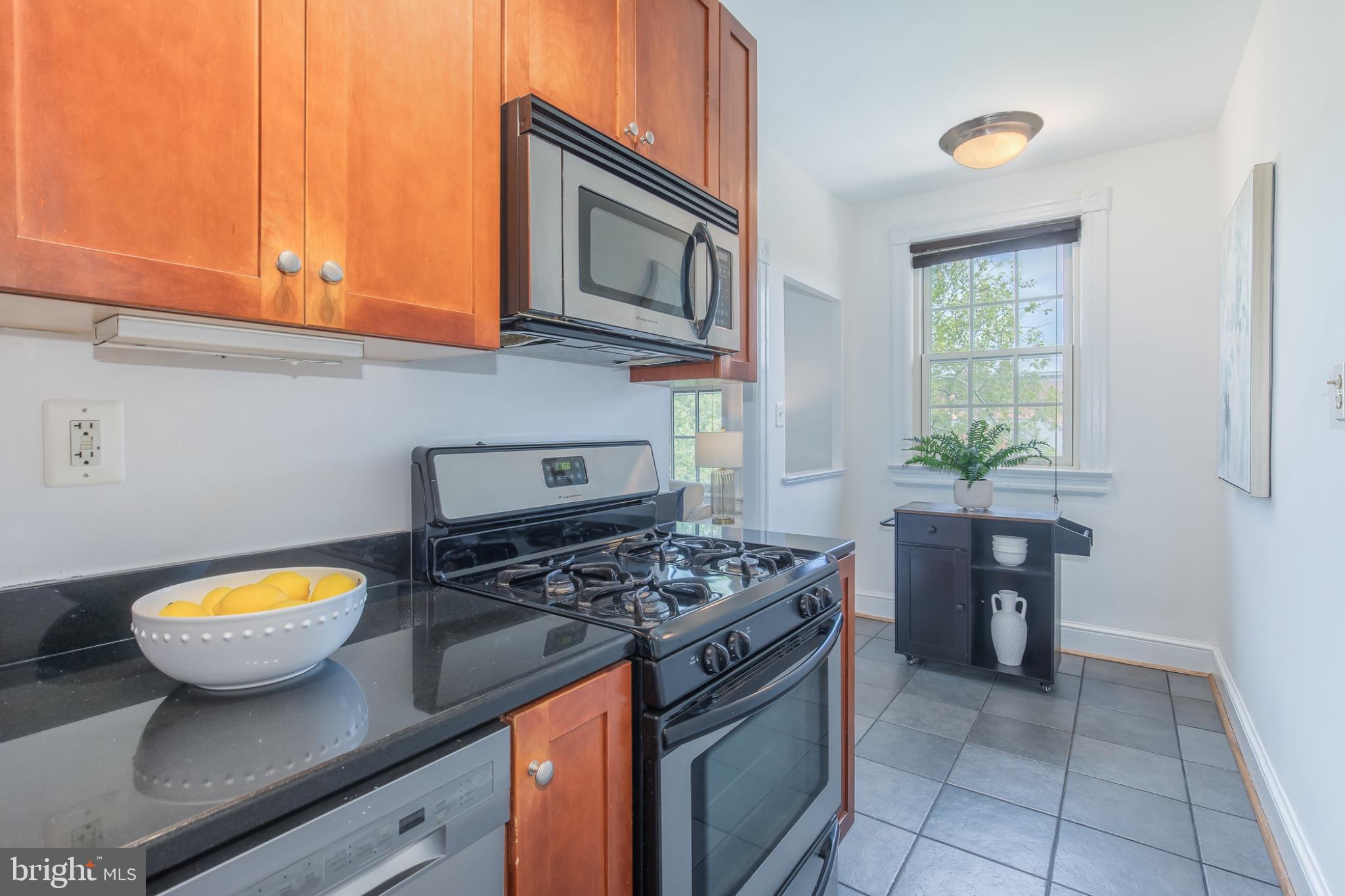 3314 Mt Pleasant Street Northwest, Unit 41 Washington, DC 20010 - Photo 21 of 30 Modern kitchen with sleek finishes.