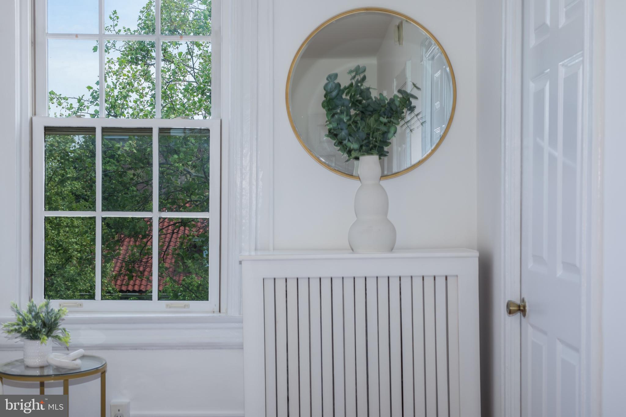 3314 Mt Pleasant Street Northwest, Unit 41 Washington, DC 20010 - Photo 27 of 30 Bright and airy corner with greenery.