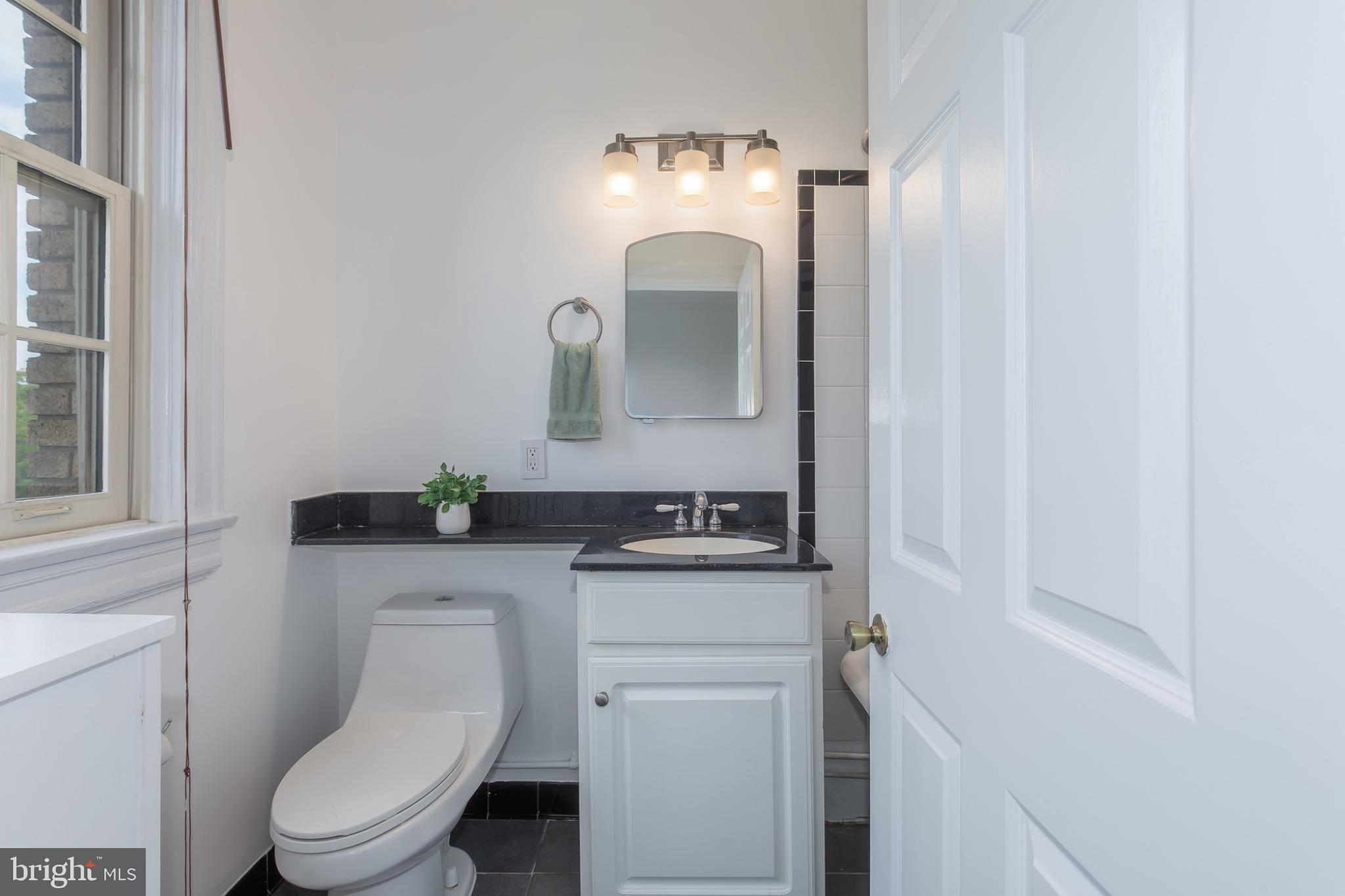 3314 Mt Pleasant Street Northwest, Unit 41 Washington, DC 20010 - Photo 29 of 30 Sleek and modern bathroom retreat.