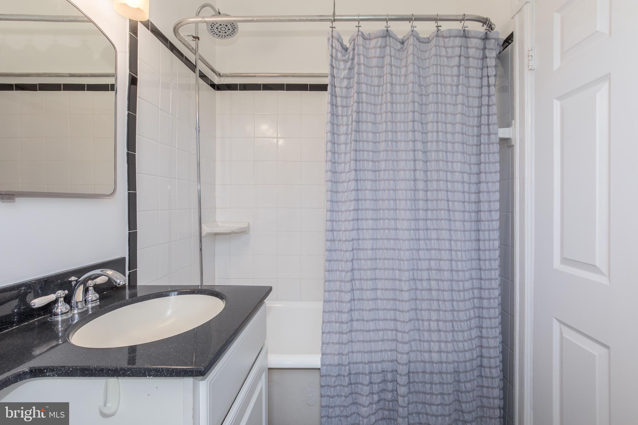3314 Mt Pleasant Street Northwest, Unit 41 Washington, DC 20010 - Photo 30 of 30 Modern bathroom with sleek finishes.