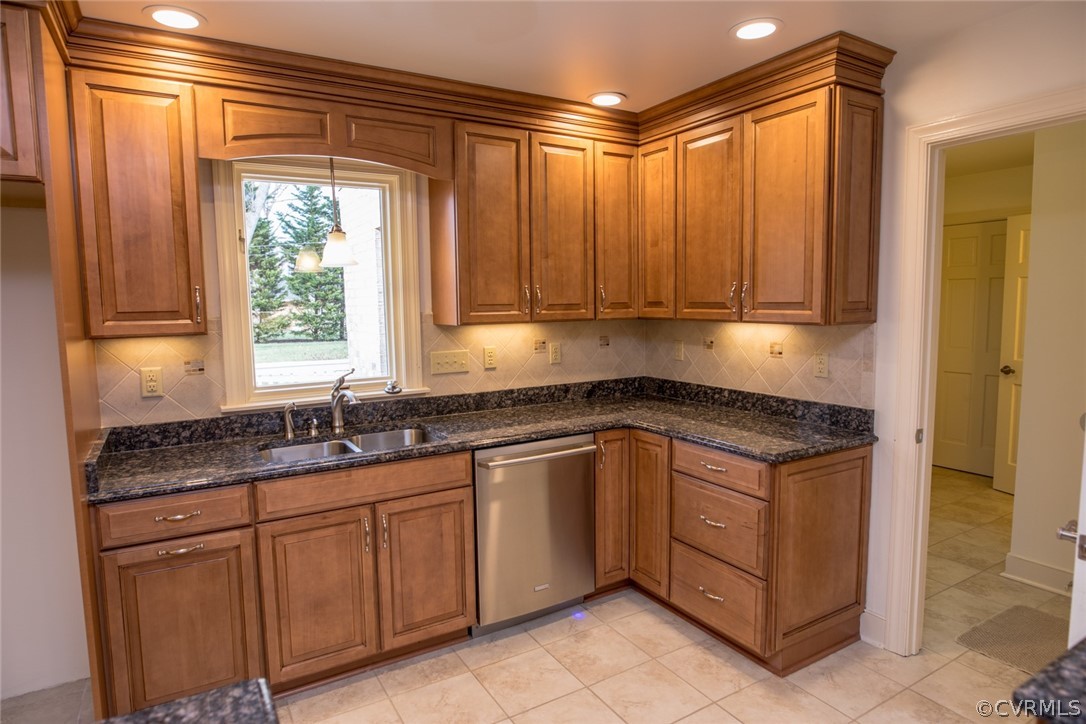 9950 Lumlay Road Chesterfield, VA 23236 - Photo 13 of 41 a kitchen with granite countertop a sink and a stove