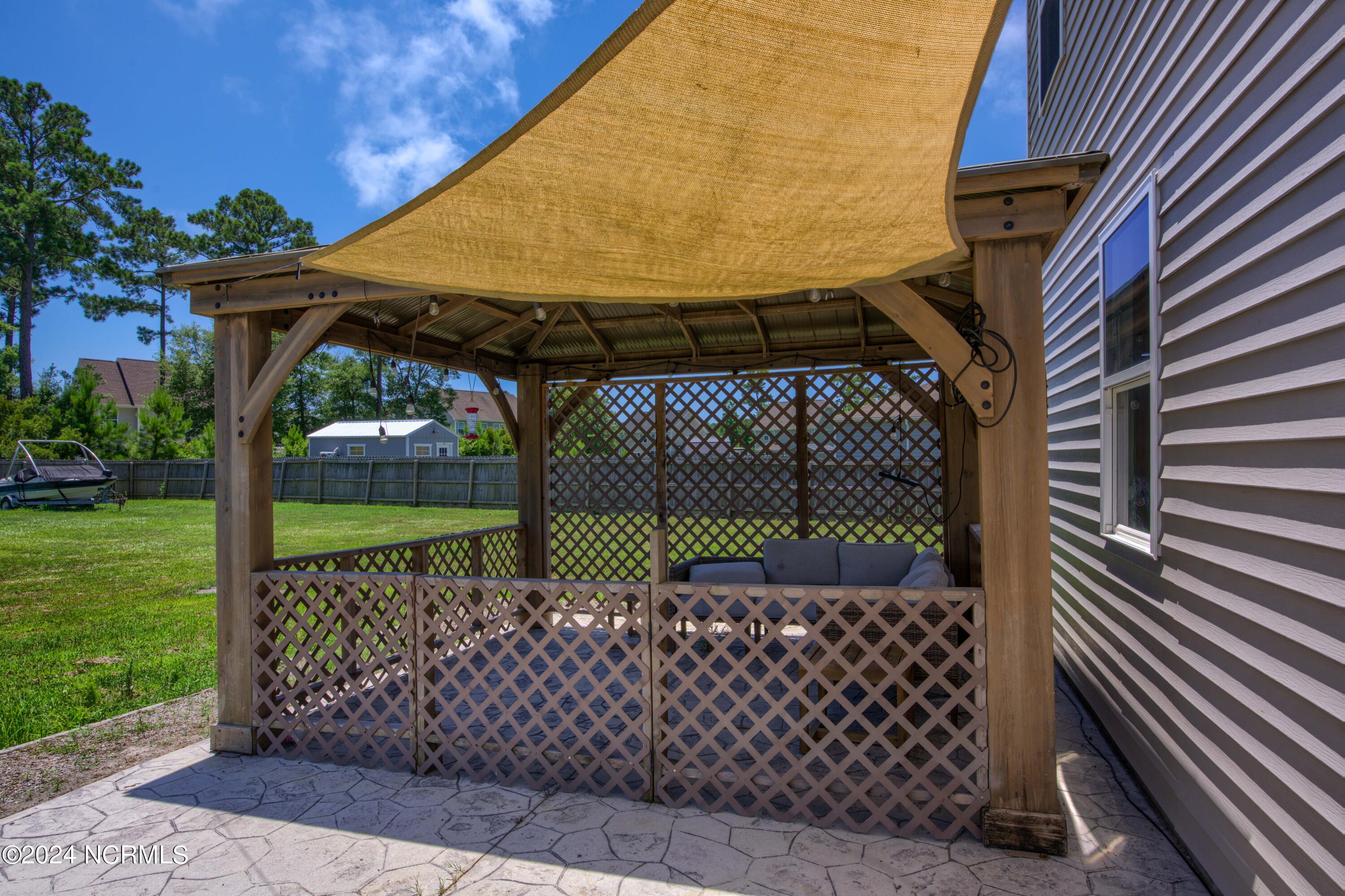 405 Saxby Way Holly Ridge, NC 28445 - Photo 11 of 54 Gazebo over patio