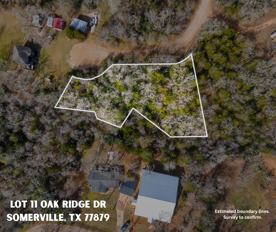 an aerial view of residential house with outdoor space